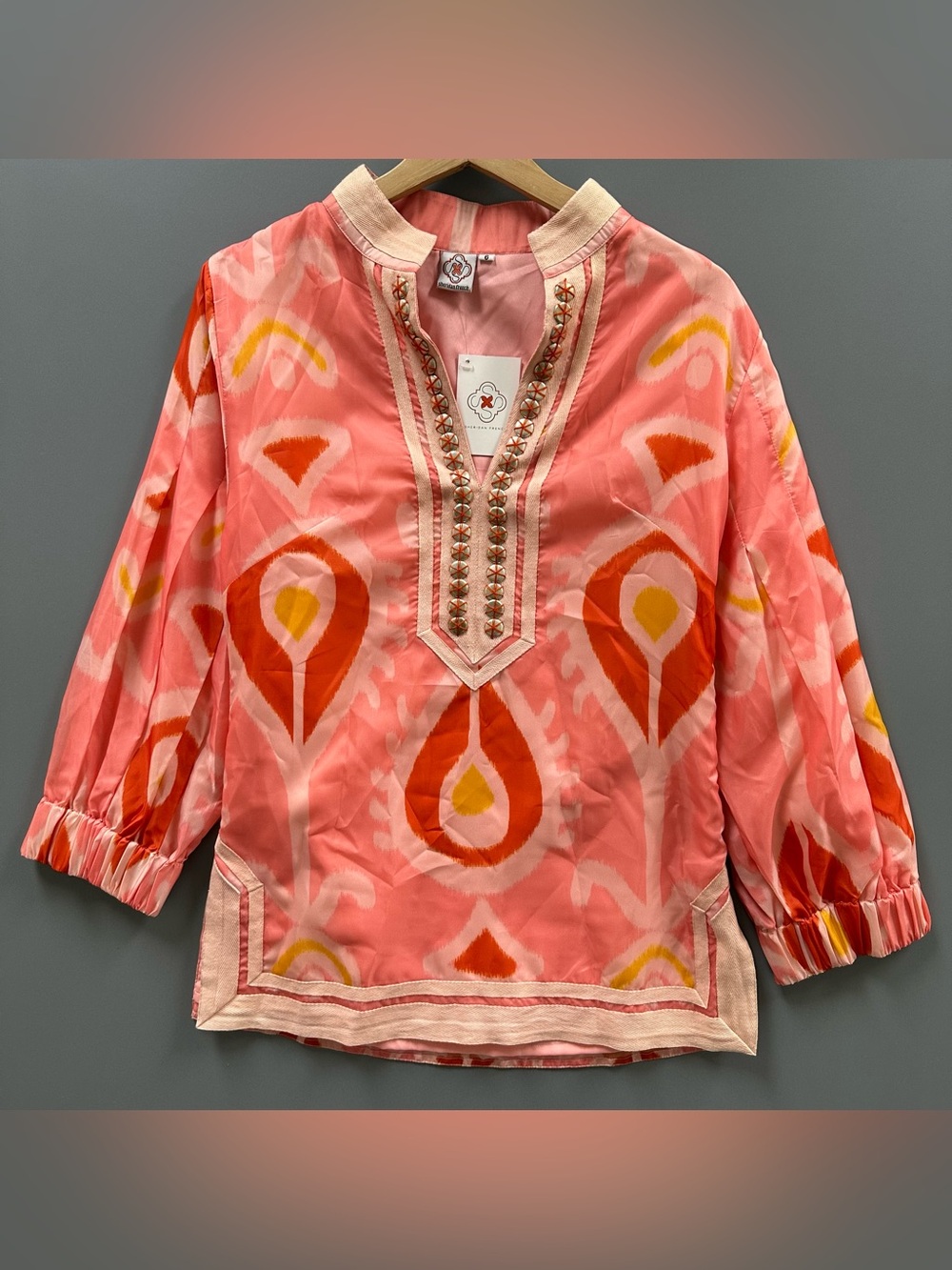 Coral-Pink Embellished V-Neck Tunic with Ikat Print